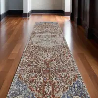 Photo of 10' Ivory Blue and Orange Oriental Power Loom Runner Rug With Fringe