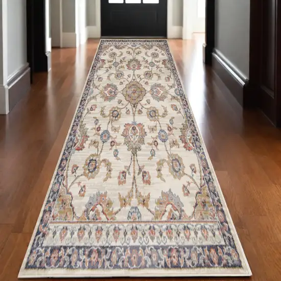 10' Ivory Navy and Orange Floral Power Loom Runner Rug Photo 1