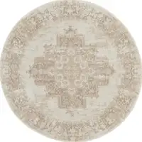 Photo of 4' Ivory Floral Power Loom Worn Faded Round Rug