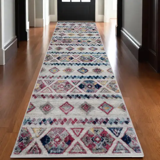 10' Ivory Blue and Orange Geometric Power Loom Runner Rug Photo 1