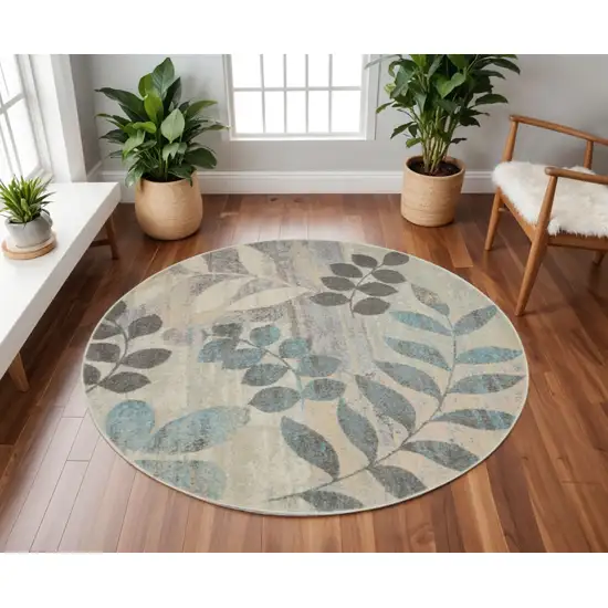 8' Ivory Gray And Blue Botanical Leaves Round Rug Photo 1