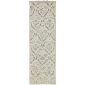 Photo of 8' Ivory Gray And Blue Wool Floral Hand Knotted Stain Resistant Runner Rug