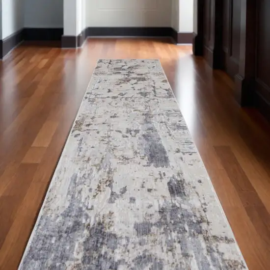 10' Ivory Gray and Blue Abstract Power Loom Worn Faded Runner Rug Photo 1