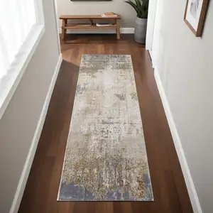 Photo of 8' Ivory Gray and Brown Abstract Power Loom Worn Faded Runner Rug