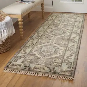 Photo of 14' Ivory Gray and Brown Wool Geometric Hand Knotted Runner Rug With Fringe