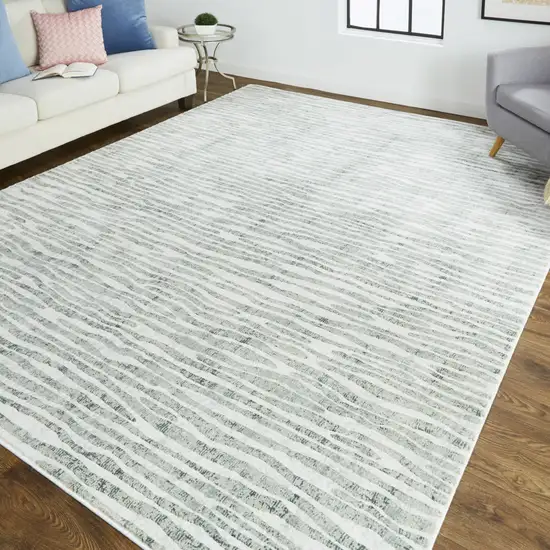 8' Ivory Gray and Green Abstract Power Loom Worn Faded Runner Rug Photo 4