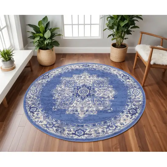 8' Ivory Navy Blue and Beige Floral Medallion Round Rug Photo 1