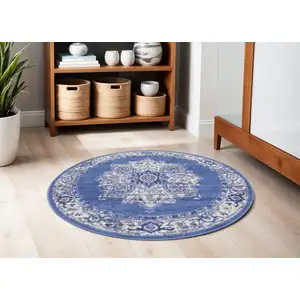 Photo of 5' Ivory Navy Blue and Beige Floral Medallion Round Rug