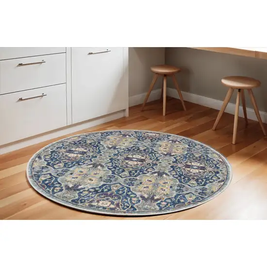 6' Ivory Navy Blue and Yellow Floral Distressed Non Skid Round Rug Photo 1