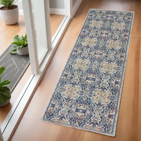 6' Ivory Navy Blue and Yellow Floral Distressed Non Skid Runner Rug Photo 1