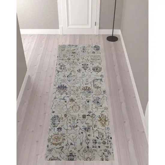 10' Ivory Orange And Blue Floral Power Loom Distressed Runner Rug With Fringe Photo 2