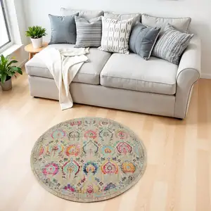 Photo of 4' Ivory Pink And Orange Floral Distressed Round Rug