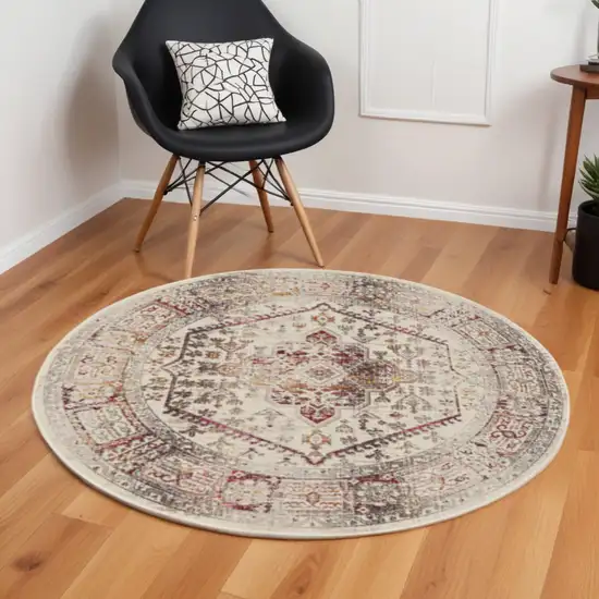 6' Ivory Red And Orange Floral Distressed Round Rug Photo 1