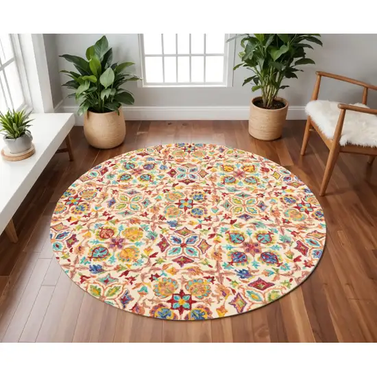 8' Ivory Red And Orange Wool Floral Hand Tufted Round Rug Photo 1