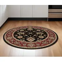 Photo of 6' Ivory Red and Black Floral Round Rug