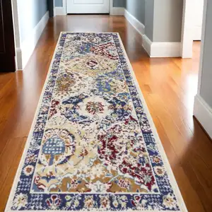 Photo of 12' Ivory Red and Blue Ogee Distressed Runner Rug