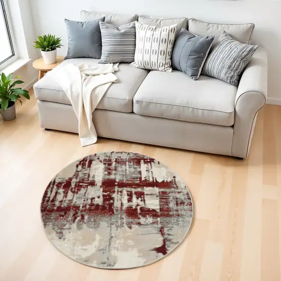 4' Ivory Red and Gray Abstract Round Rug Photo 1