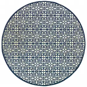 Photo of 8' Ivory Round Geometric Stain Resistant Indoor Outdoor Area Rug