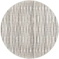 Photo of 10' Ivory Round Ombre Tufted Handmade Area Rug