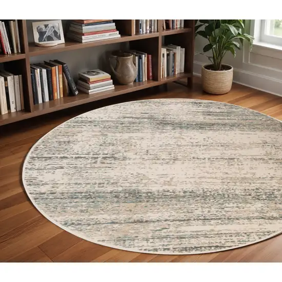 8' Gray and Ivory Abstract Power Loom Round Rug Photo 1