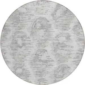 Photo of 8' Ivory Silver And Taupe Round Abstract Washable Indoor Outdoor Area Rug