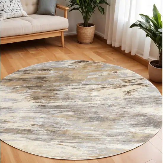 8' Brown and Ivory Abstract Non Skid Round Rug Photo 1