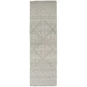 Photo of 10' Ivory Tan And Gray Geometric Hand Knotted Runner Rug