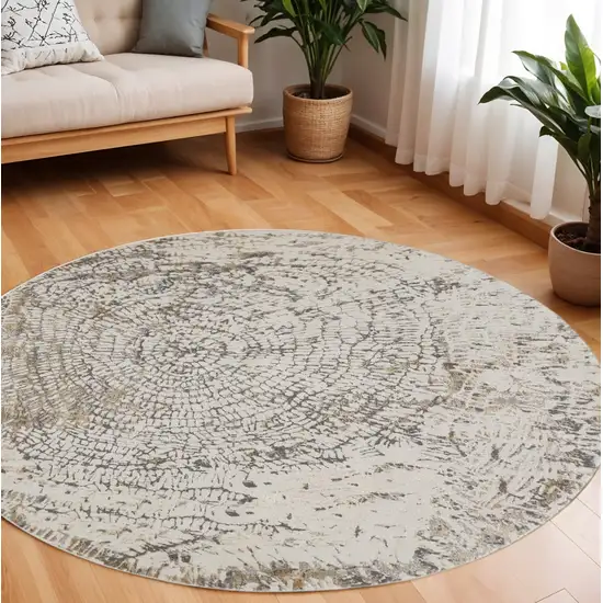 8' Gray and Ivory Abstract Non Skid Round Rug Photo 1