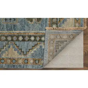 Photo of 12' Ivory Tan and Blue Wool Oriental Hand Knotted Runner Rug With Fringe