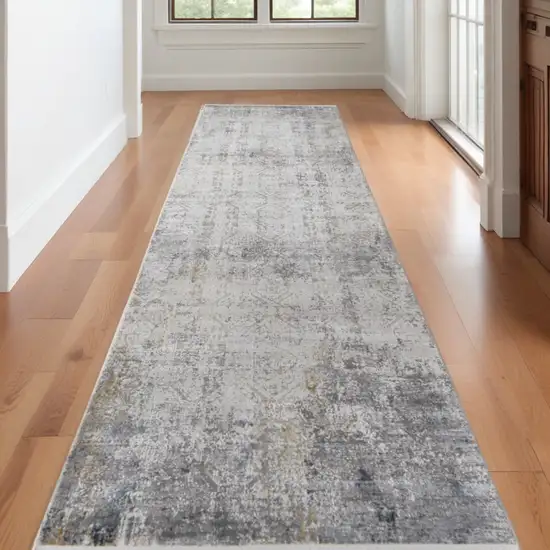 10' Ivory Taupe and Gray Abstract Power Loom Distressed Runner Rug With Fringe Photo 1