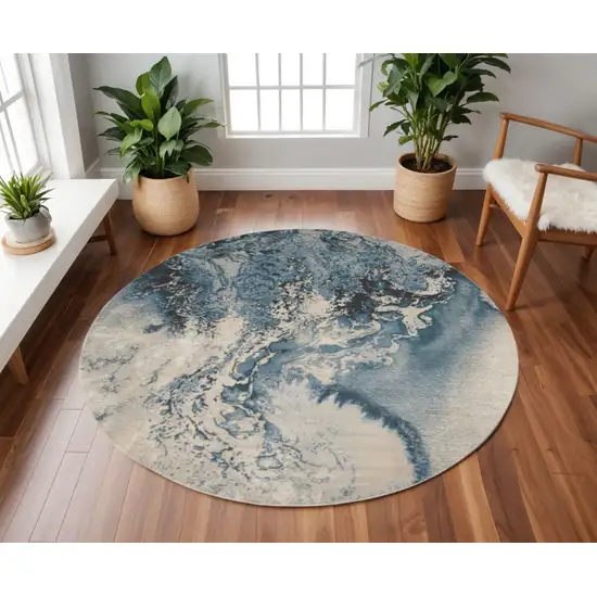 8' Ivory Teal Blue and Black Abstract Non Skid Round Rug Photo 1