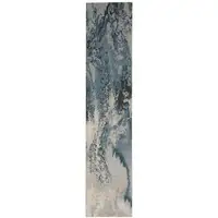 Photo of 8' Ivory Teal Blue and Black Abstract Non Skid Runner Rug