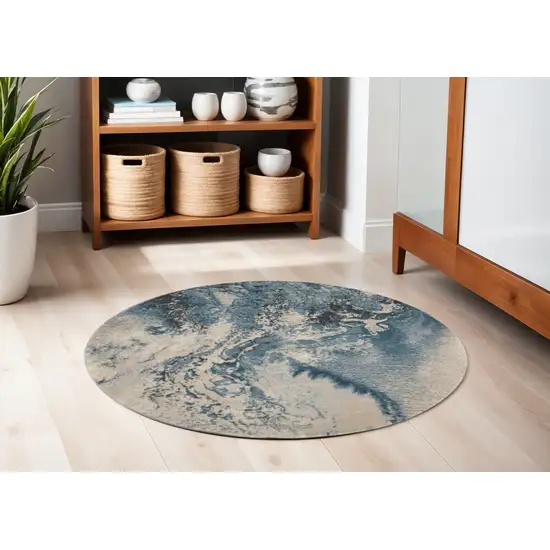 4' Ivory Teal Blue and Black Abstract Round Rug Photo 1