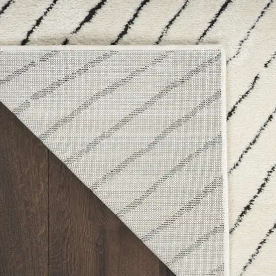 10' Ivory and Black Geometric Runner Rug Photo 9