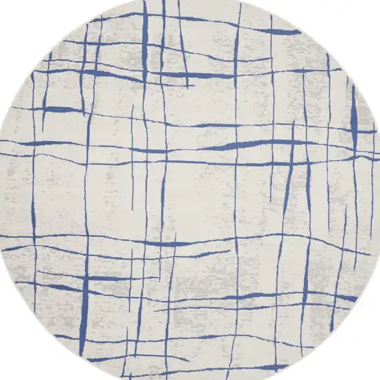 8' Ivory and Blue Abstract Distressed Round Rug Photo 6