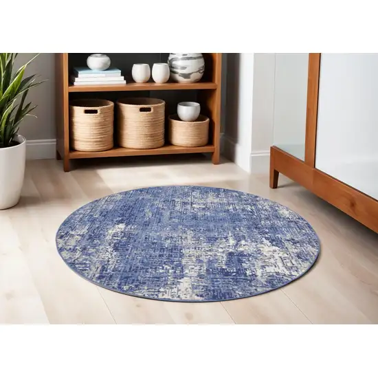 5' Ivory and Blue Abstract Distressed Round Rug Photo 1