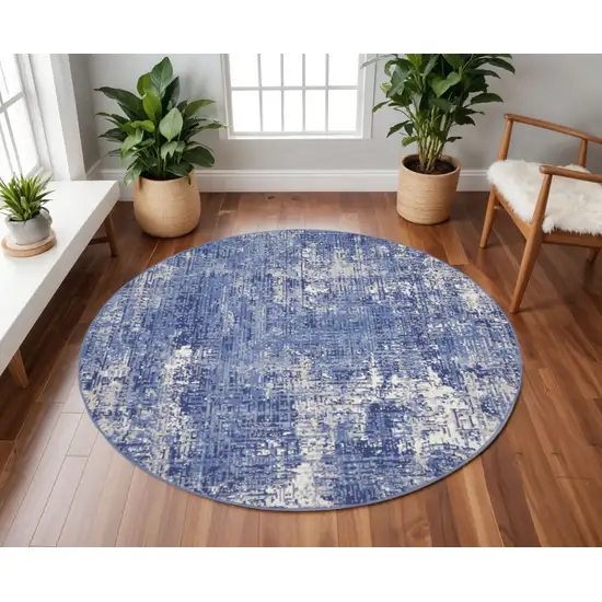 8' Ivory and Blue Abstract Distressed Round Rug Photo 1