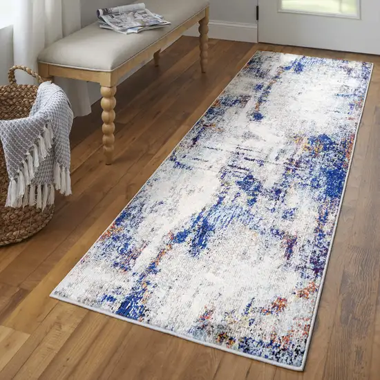 8' Ivory and Blue Abstract Power Loom Distressed Runner Rug Photo 5