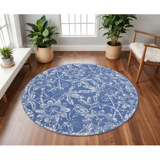 8' Ivory and Blue Floral Distressed Round Rug Photo 1