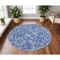 Photo of 8' Ivory and Blue Floral Distressed Round Rug