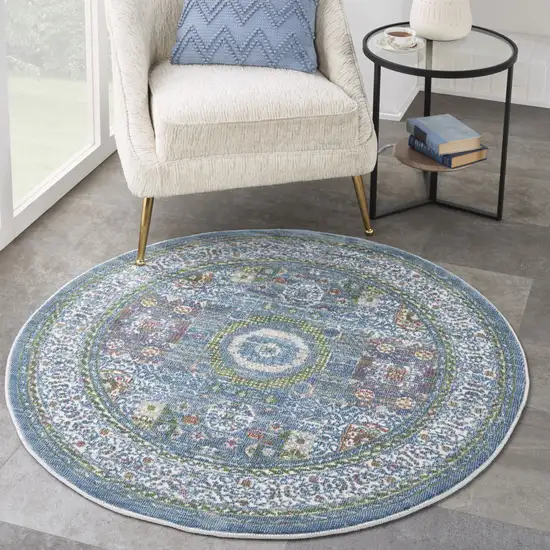 4' Ivory and Blue Geometric Distressed Non Skid Round Rug Photo 9