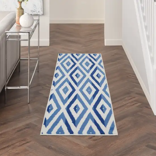 8' Ivory and Blue Geometric Distressed Non Skid Runner Rug Photo 9