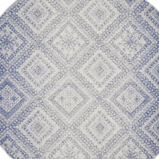 8' Ivory and Blue Geometric Distressed Round Rug Photo 4