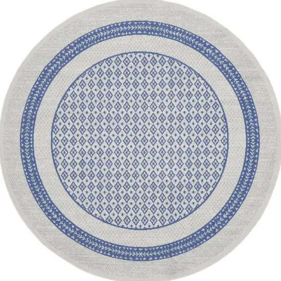 8' Ivory and Blue Geometric Distressed Round Rug Photo 8