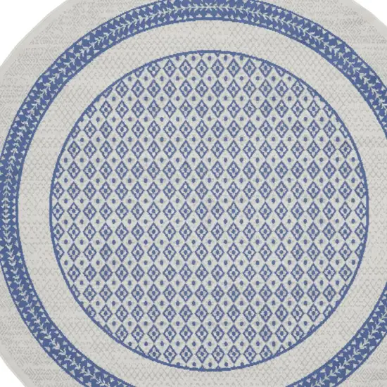 8' Ivory and Blue Geometric Distressed Round Rug Photo 7