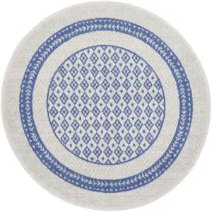 Photo of 5' Ivory and Blue Geometric Distressed Round Rug