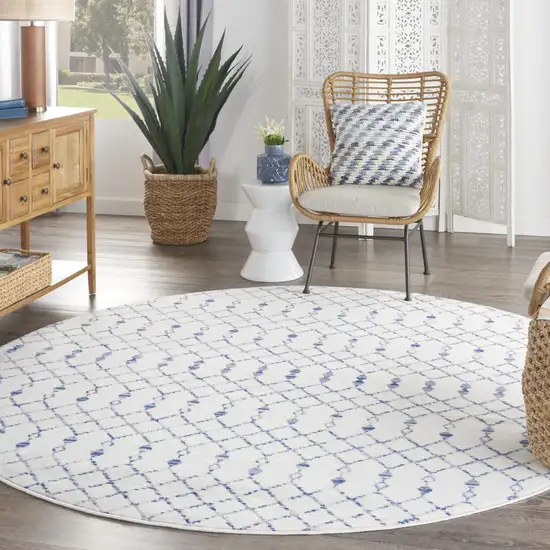 8' Ivory and Blue Geometric Round Rug Photo 9