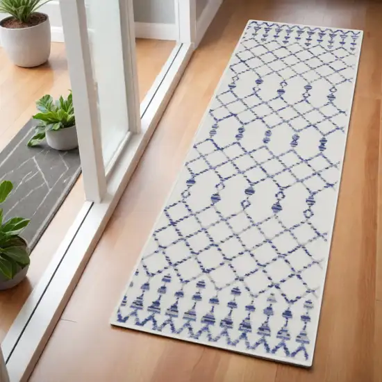 6' Ivory and Blue Geometric Runner Rug Photo 1