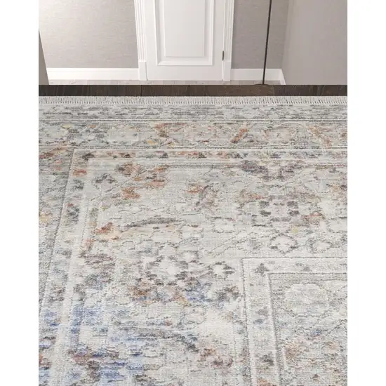 12' Ivory and Blue Oriental Power Loom Distressed Runner Rug With Fringe Photo 2