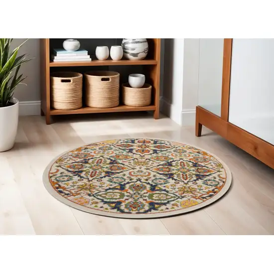 5' Ivory and Blue Round Floral Power Loom Area Rug Photo 1